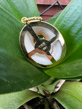 Limpet Shell Pendant with Emerald