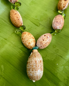 Cyprea Shell Necklace with Peridot Briolettes