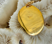Limpet Shell Pendant with Pyrope Garnet