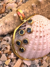 Cockle Shell Pendant with Sapphire