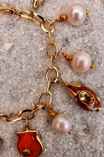 14-karat Charm Bracelet with Pearls & Shell Charms